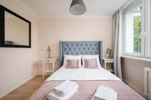 Afrykańska Deluxe Apartment by BookingHost