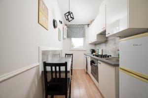 Afrykańska Deluxe Apartment by BookingHost