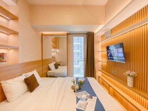 Cozy Studio at 7th Floor Tokyo Riverside PIK 2 Apartment By Travelio