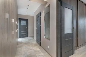 Air-conditioned Apartment in Poznań with Parking by Noclegi Renters