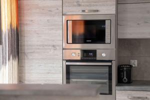 Air-conditioned Apartment in Poznań with Parking by Noclegi Renters