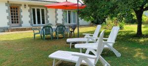 Maison dans îlot de verdure