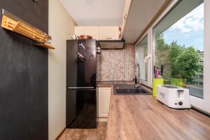 Wild and Free Urban Jungle Apartment by BookingHost