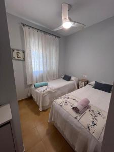 Casa coqueta con jardin