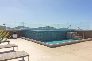 Estadia com piscina e sauna a poucos passos da praia em Cabo Frio - HSC