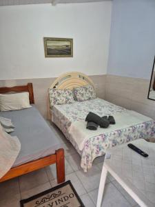 Casa arara suite 2 ou 3 com piscina para relaxar estacionamento gratuito e café da manhã self-service para começar bem o dia Comodidade e ótima localização