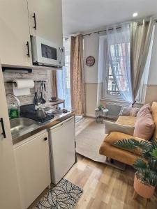 Charmant 2 pièces cozy avec balcon