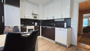 Tilava kaksio, saunalla ja sähköauton latauksella.