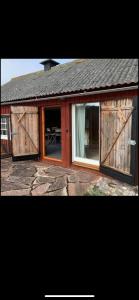 Stuga på gård i Böda socken