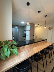 Edifício Frente Mar Apto lateral