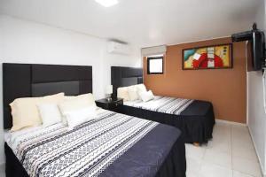 Hermosa casa de playa, alberca frente al mar