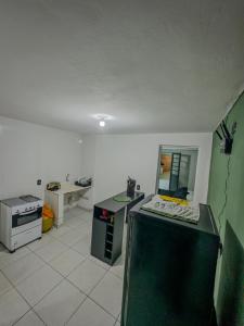 Suite com cozinha 250m do centro