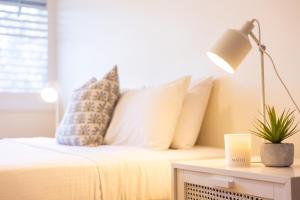 Surfrider - Beach front apartment with pool