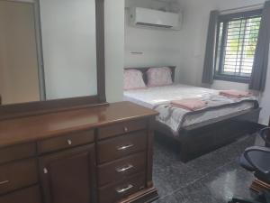 Sivarama garden resort 8 AC living hall with 8 AC BHK stay &2 swimming pools& Box Cricket, settil andnear beach road, vishakhapatnam