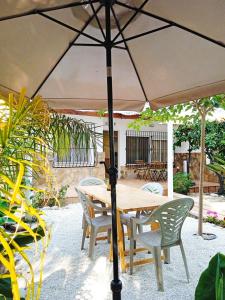 Cozy house next to a cove on the beach