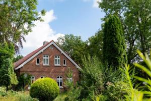 Friesenwind - Hochwertige Ferienwohnung mit Gartenoase