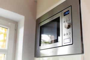 Friesenwind - Hochwertige Ferienwohnung mit Gartenoase