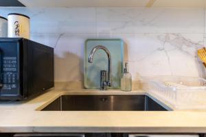 White Sage Modern Studio in JVC with Balcony and City Views