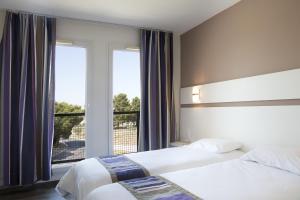 Hotels Hotel Du Village Catalan : photos des chambres