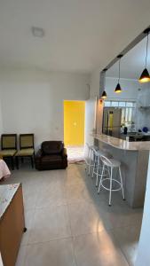 Casa na praia com piscina 2 quartos 6 camas e 4 colchoes