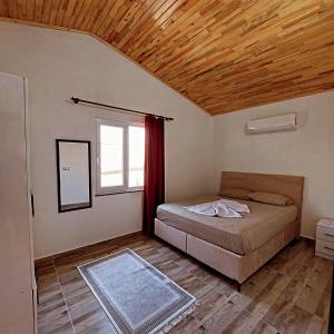 OLYMPOS YÖRÜK OTAĞI APART EVLERİ