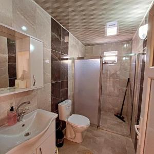 OLYMPOS YÖRÜK OTAĞI APART EVLERİ