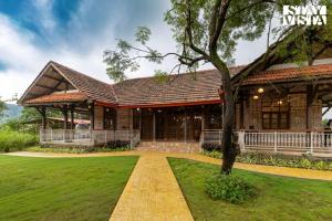 StayVista at Orchard by the River with Bonfire, BBQ