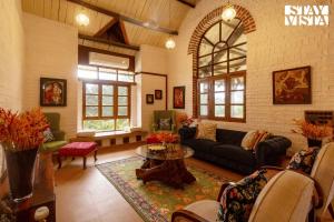 StayVista at Orchard by the River with Bonfire, BBQ