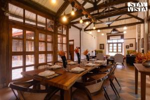 StayVista at Orchard by the River with Bonfire, BBQ