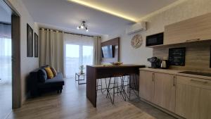 Q Apart Orion - dwupokojowy, klimatyzowany apartament przy Manufakturze z darażem Gratis, FV