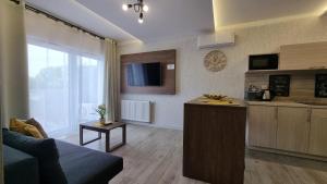 Q Apart Orion - dwupokojowy, klimatyzowany apartament przy Manufakturze z darażem Gratis, FV