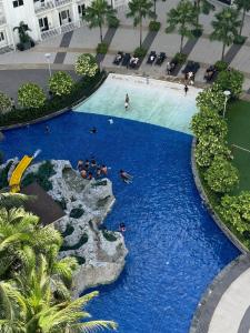 Matcha Latte Room Shore Residences Rm 850 near SMX, Airport & MOA by Prime Stay