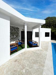 Villa DMM con piscina, jacuzzi y gran área verde en Punta Cana