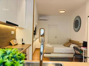 Cozy apartment, at Pagrati close to Kalimarmaro, Athens city center