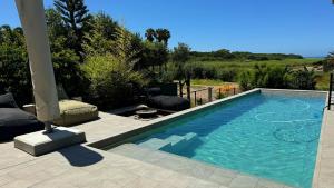 Lagoon House - lagoon view with heated pool