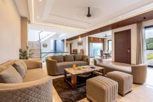 Gardenia 4-BHK Farmhouse with Private Pool, Game Zone, & Lush Garden