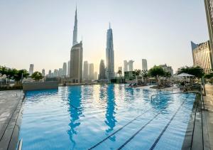 Boho Comfort - 1BR with Gym, Pool, Tennis, Yoga and Dubai Mall access