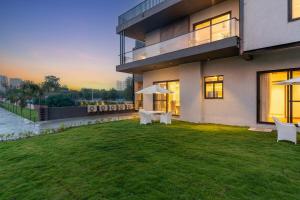 Gardenia 4-BHK Farmhouse with Private Pool, Game Zone, & Lush Garden