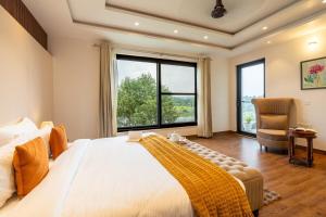 Gardenia 4-BHK Farmhouse with Private Pool, Game Zone, & Lush Garden