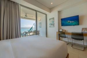 Suite con 2 camas, vista al mar y piscina CB1223