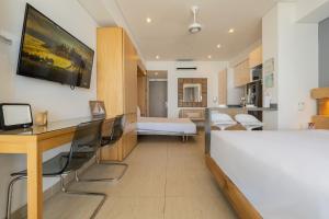 Suite con 2 camas, vista al mar y piscina CB1223