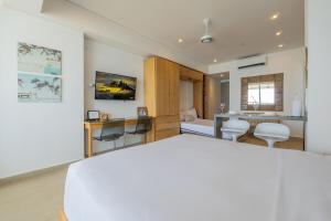 Suite con 2 camas, vista al mar y piscina CB1223