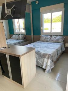 JK prox Regina e Feevale com AC e espaço Home Office