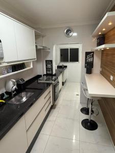 Apartamento aconchegante em Guarujá com 3 quartos