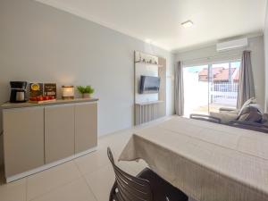 Curta Praia da Armação - Casa Tulipa