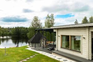 Riverside Luxury Retreat By BookLapland