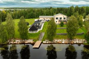 Riverside Luxury Retreat By BookLapland