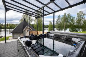 Riverside Luxury Retreat By BookLapland