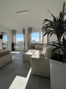 City Apartement mit Seeblick, TOPLAGE Stadtblick, Shopping & 1 Minute zum Bodensee - 3hvězdičkové hotely ve městě Friedrichshafen