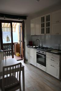 Casa Corgol con vista lago e montagne